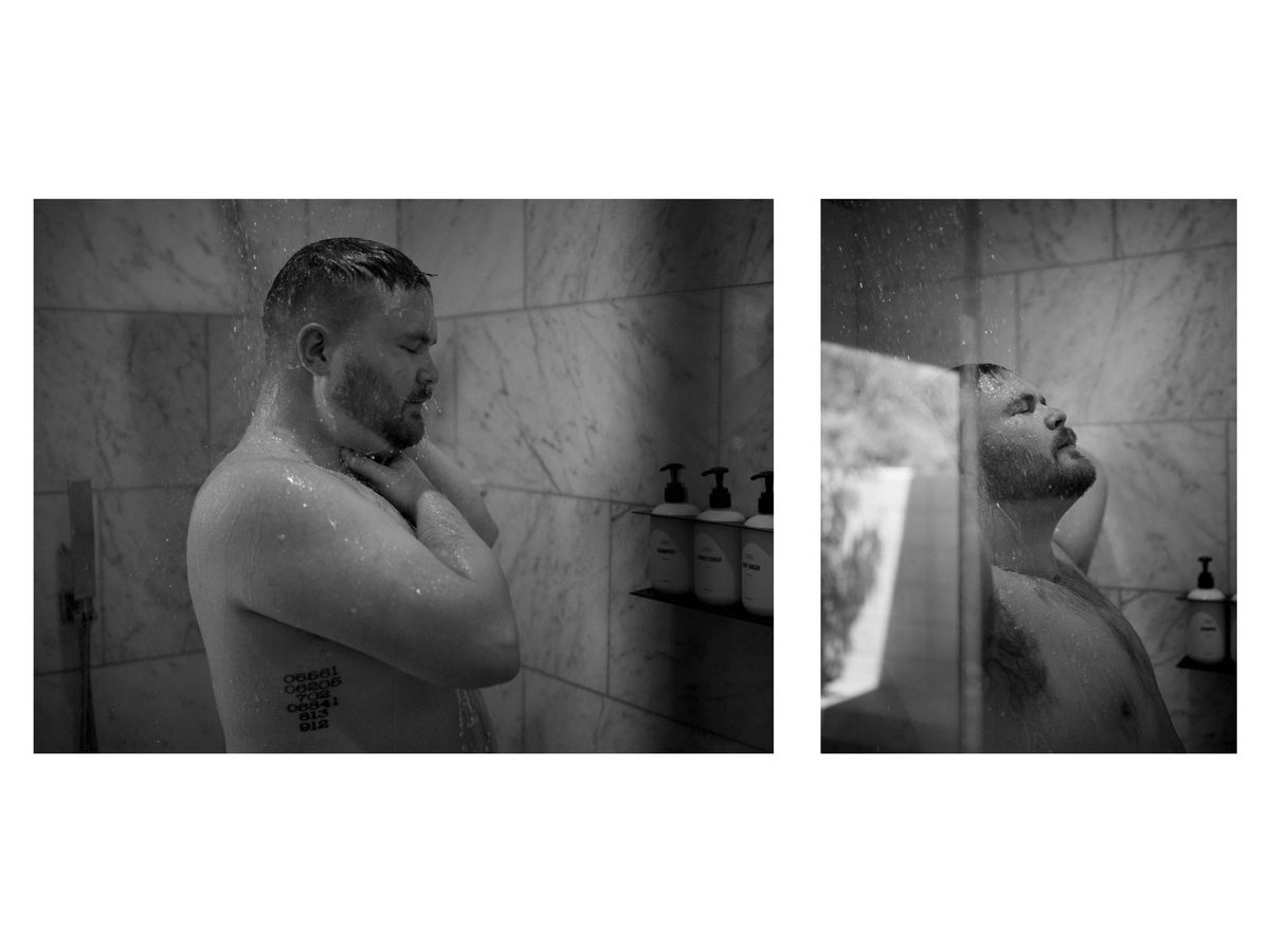 Spread 7 of 18 from Twin Palms: two photographs of a bearded man showering, water running over his face and shoulders; black and white.