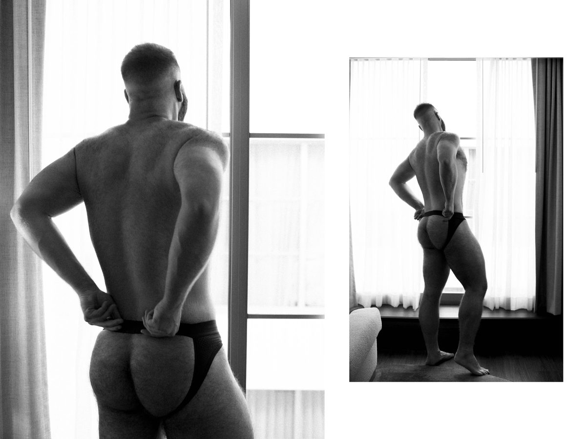 Spread 2 of 4 from A Quiet Confidence: two photographs of a muscular man in a jockstrap at a window, seen from behind and in profile; black and white.