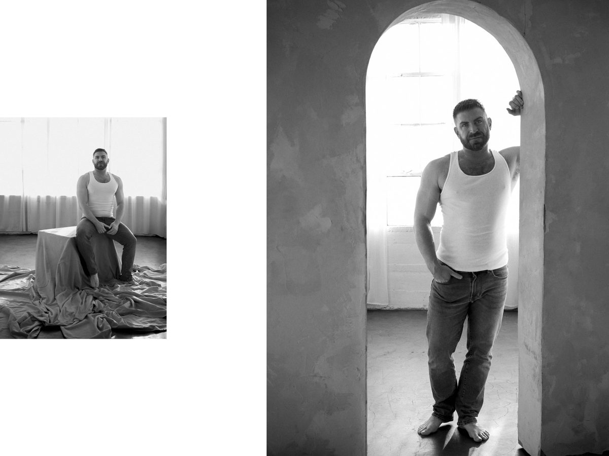 Spread 2 of 10 from Studio Sessions: two photographs of a bearded man in a tank top, seated on a block and standing in an archway; black and white.